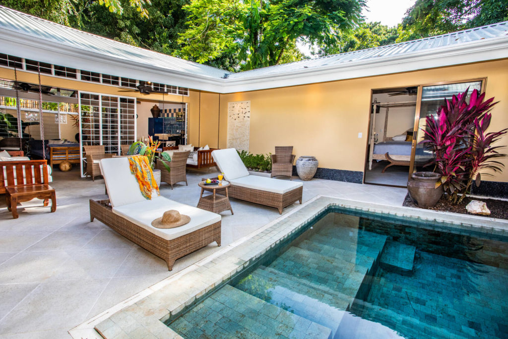 The pool area and indoor open-plan space can be merged into one when you open the huge glass sliding doors.