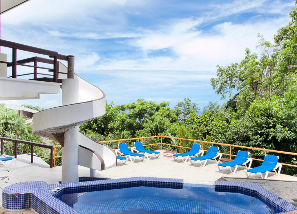 The pool area includes a winding water slide which is perfect for kids ... of all ages!