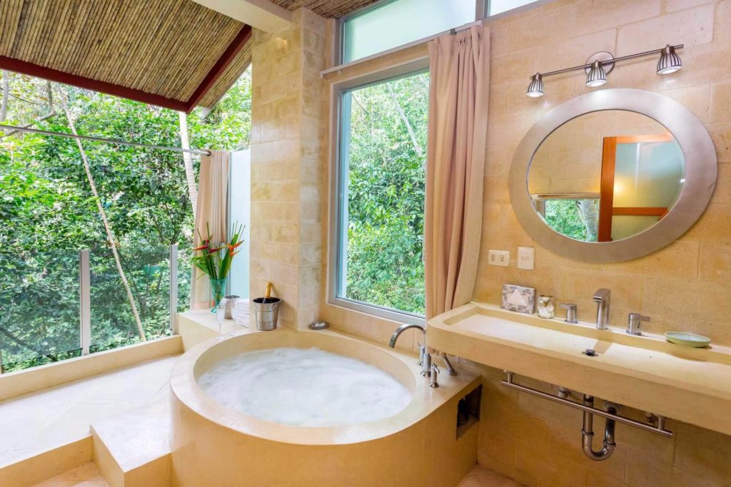 Soak away in a relaxing bubble bath in this luxury ensuite bathroom.