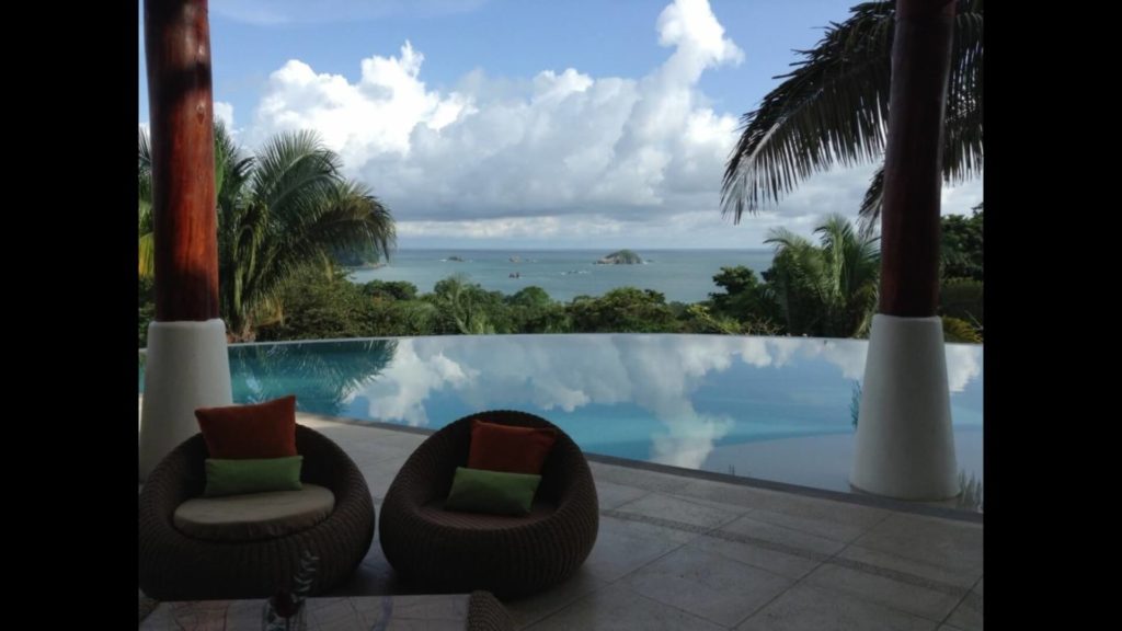 The Pacific ocean view from the huge infinity pool is spectacular at this luxury vacation rental.