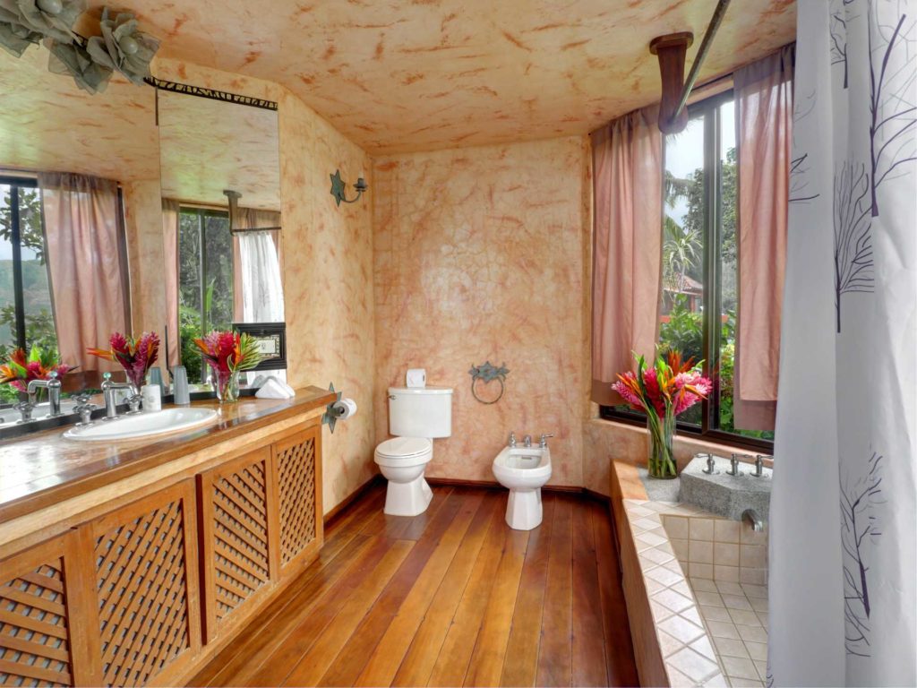 The master bathroom has a superb combination shower and bathtub.