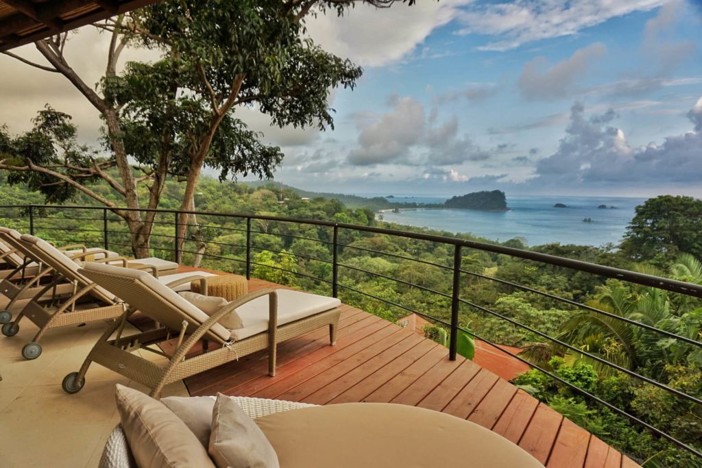 Enjoy breathtaking views of the Pacific coastline from this stunning deck high above the rainforest canopy. 