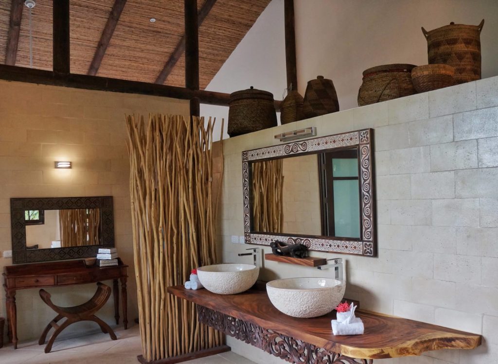 This extra large his and hers luxury bathroom is filled with beautiful natural and handcrafted details.