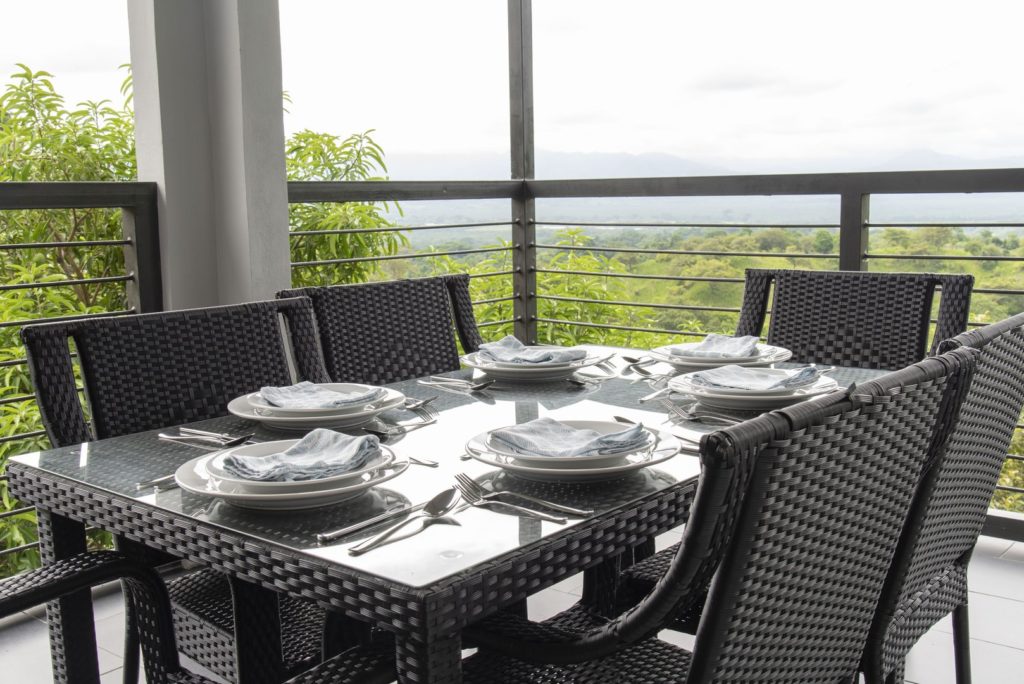 An outdoor meal is completed by the amazing views from high above the tree tops. 