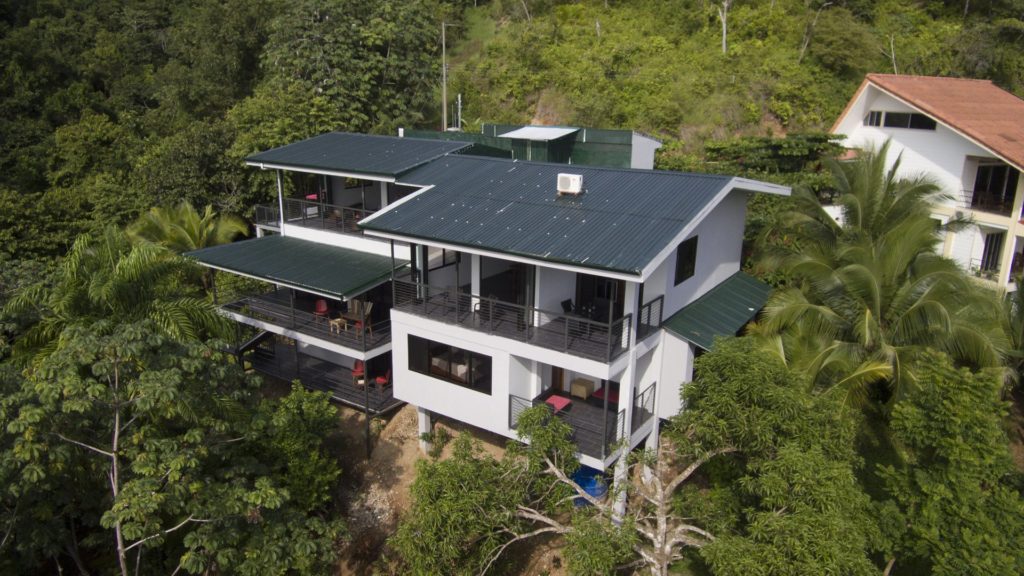 This astounding villa is nestled in the rainforest with an amazing number of balconies offering stunning views. 