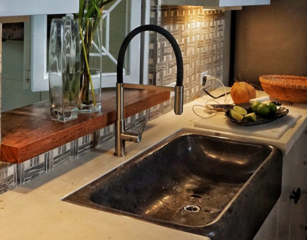 Beautiful custom sink and counters in the modern kitchen.