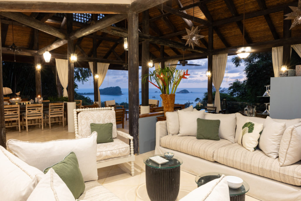 Open-design living with elegant furniture and spectacular ocean views of Manuel Antonio.
