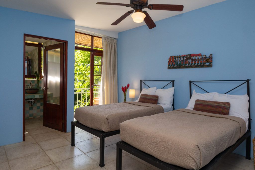 This bedroom with an ensuite bathroom in the separate pool house is perfect for the young ones.