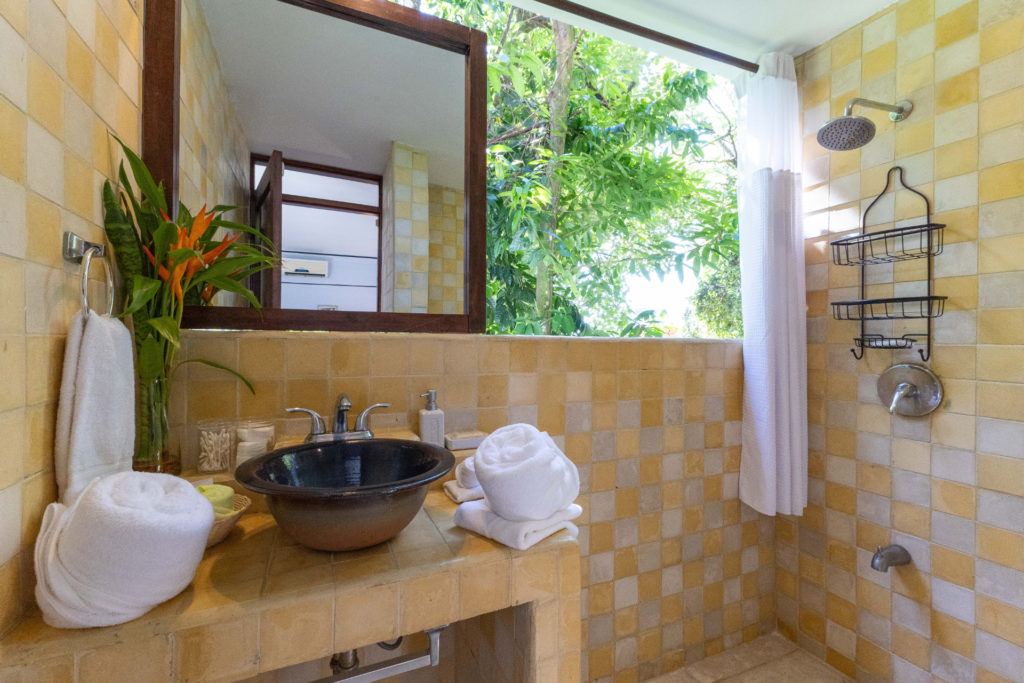 The natural design of this bathroom exudes a truly relaxing vibe.