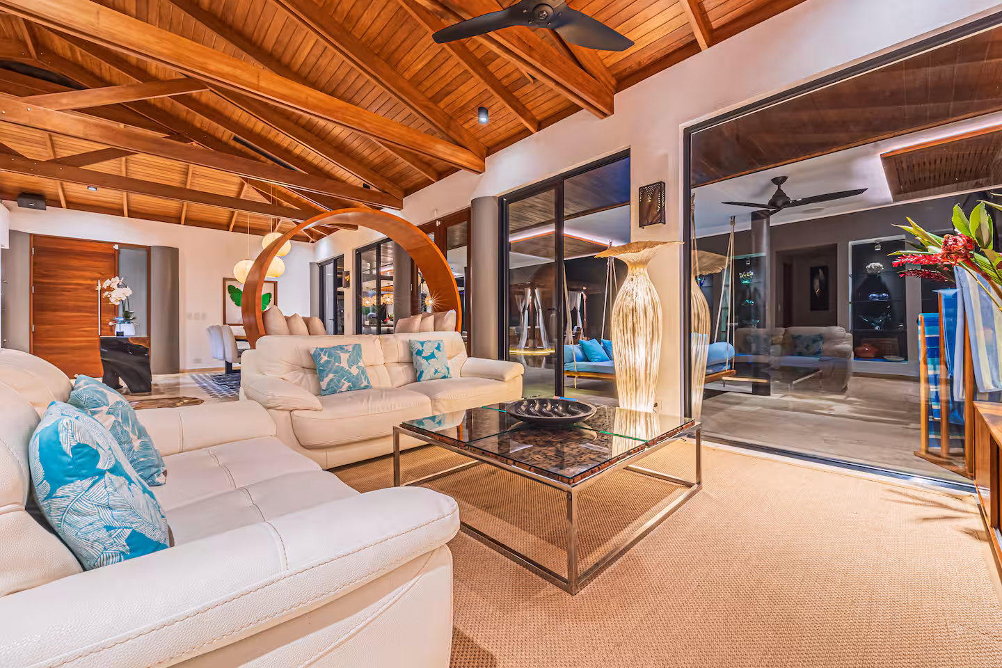 Main living area with high wood ceilings and natural light in a villa near Dominical, Costa Rica.