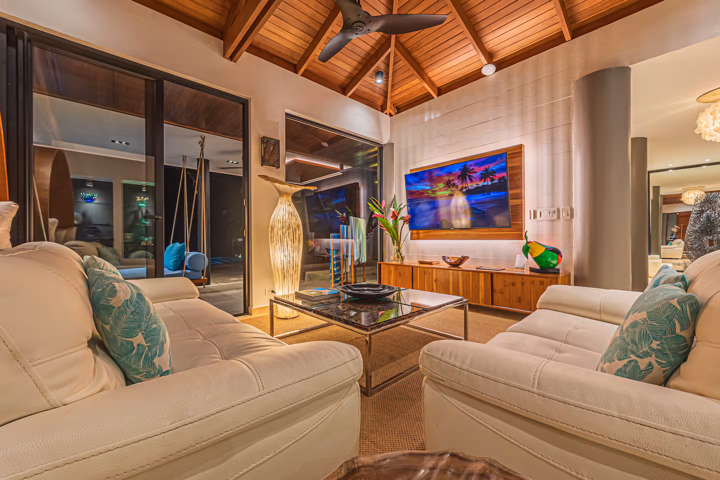 Living room with seating and direct access to the pool at a villa near Dominical, Costa Rica.