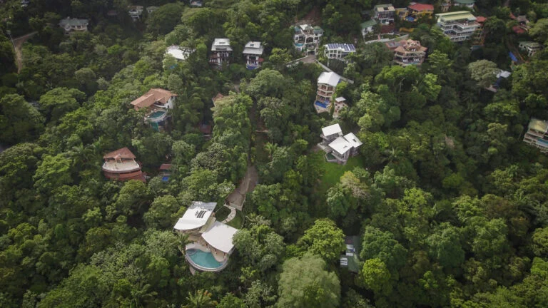 Aerial view of a luxury villa surrounded by rainforest in Manuel Antonio Costa Rica