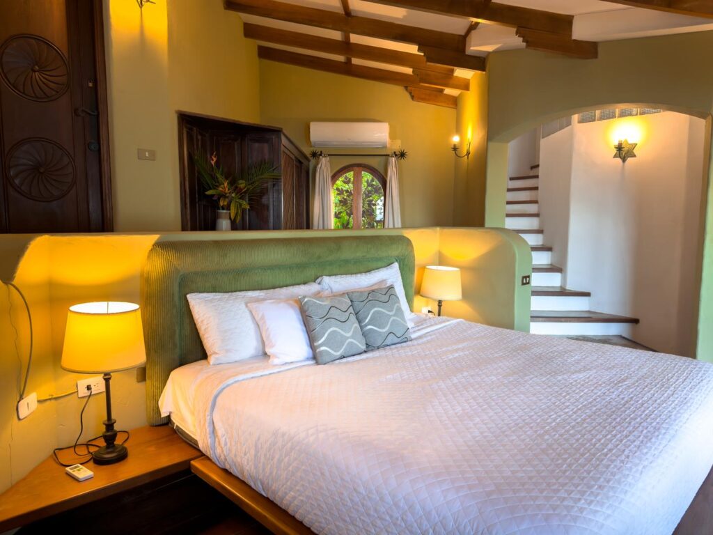 Sink into your king bed after adventures at Dominical’s pristine beaches.