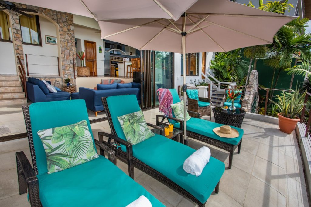 The pool deck with its gorgeous tropical backdrop is perfect for enjoying a fresh morning coffee or a cold afternoon drink. 