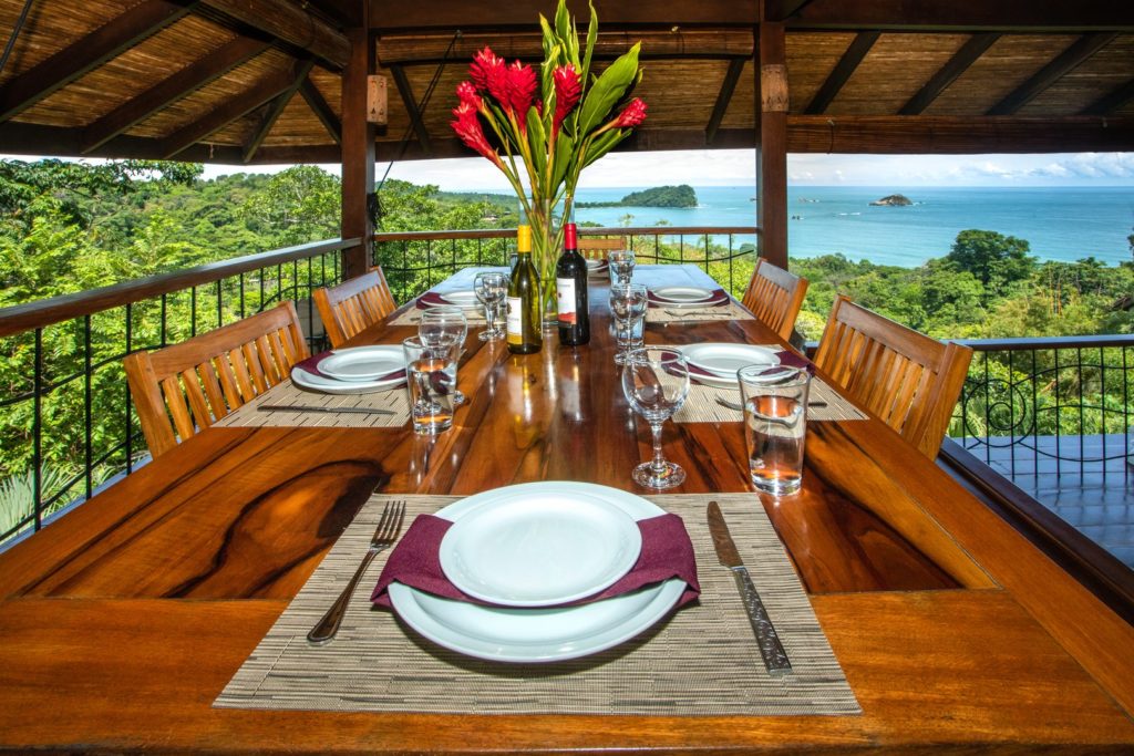 A stunning dining table where your group can enjoy delicious tropical feasts with a stunning ocean-view backdrop.