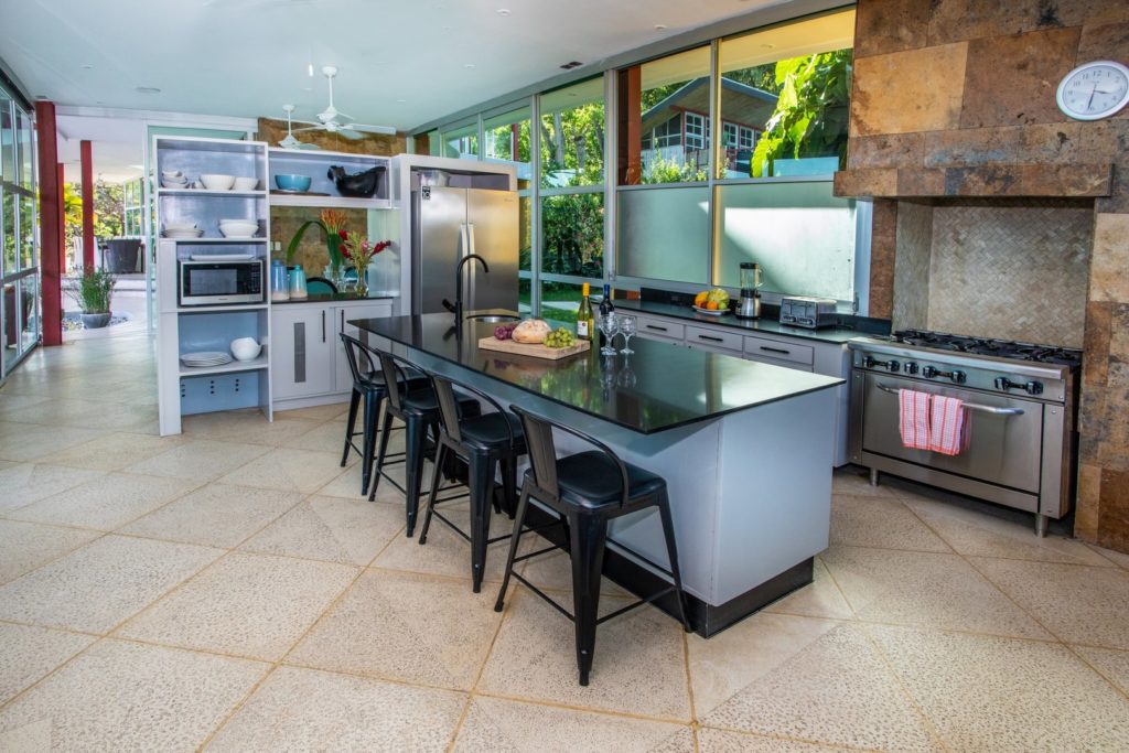 Enjoy breakfast or just a glass of wine in this well lit and luxurious kitchen.