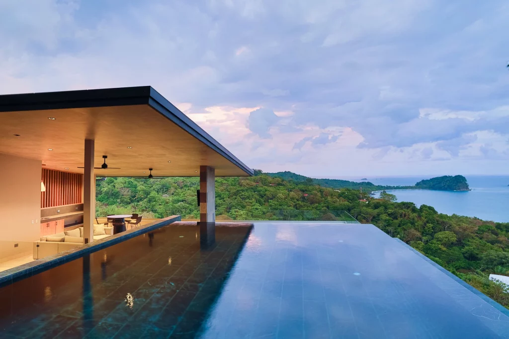 The rooftop infinity saltwater pool of this stunning villa boasts one of the finest views in all of Manuel Antonio.