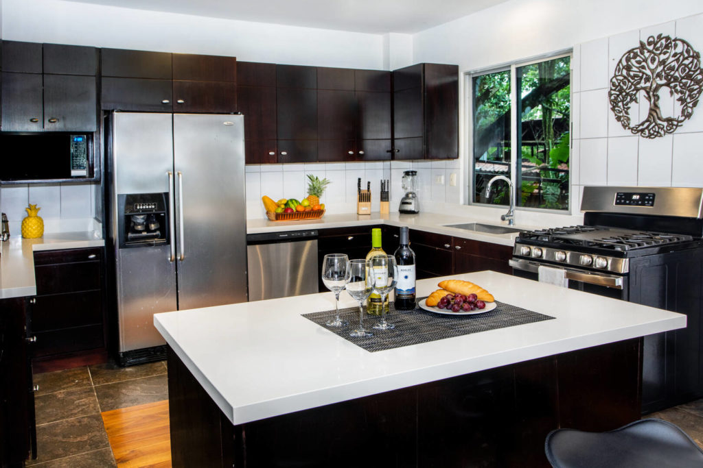 Your luxury gourmet kitchen has top-of-the-range appliances and a huge island.