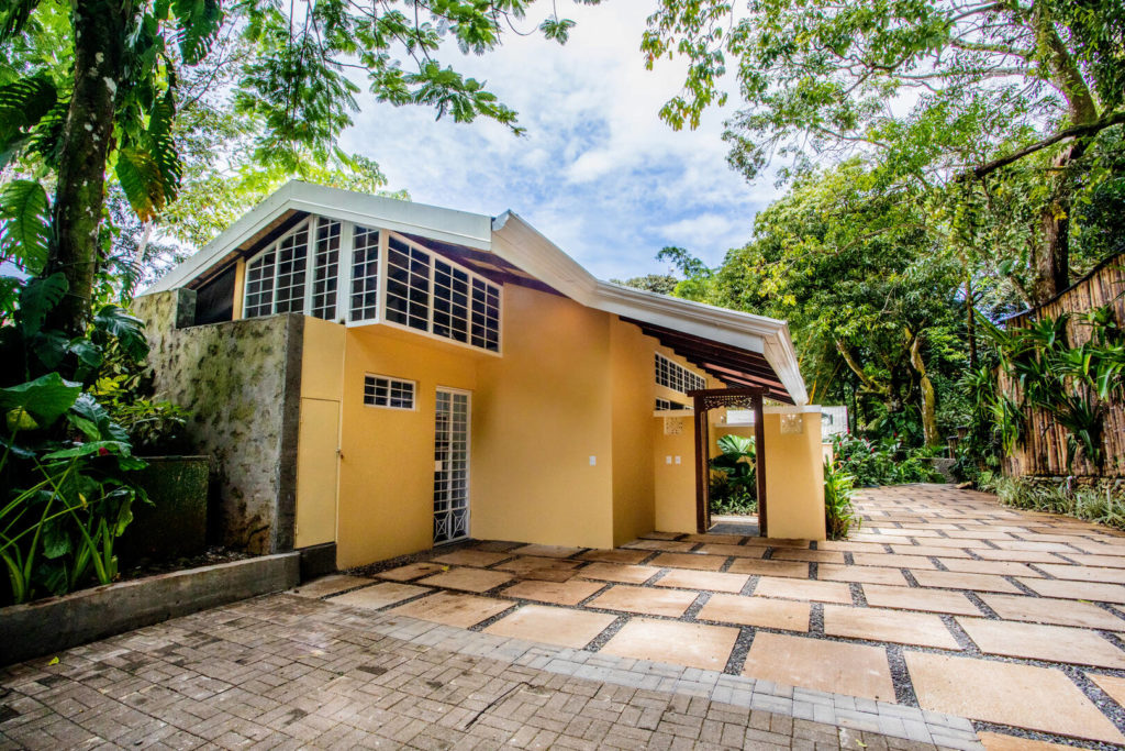 This side of the property has a tall privacy fence constructed from locally-sourced bamboo.