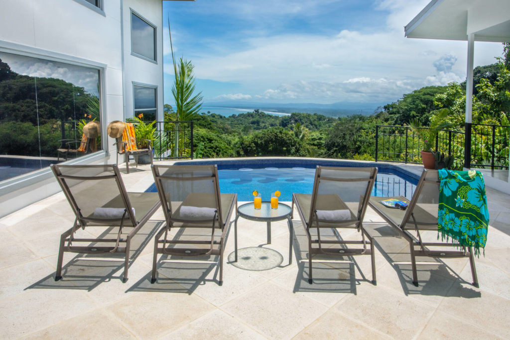 Your inviting crystal-clear pool is especially refreshing on a beautiful sunny day at your luxury villa.