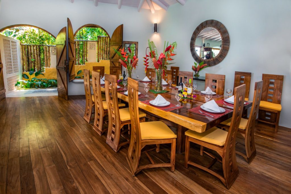 Twelve people can be seated at the large beautifully-crafted dining table.