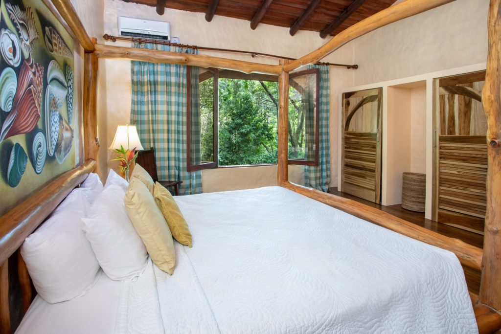 The bedrooms are beautifully decorated with natural woods and exotic art and have plenty of closet space.