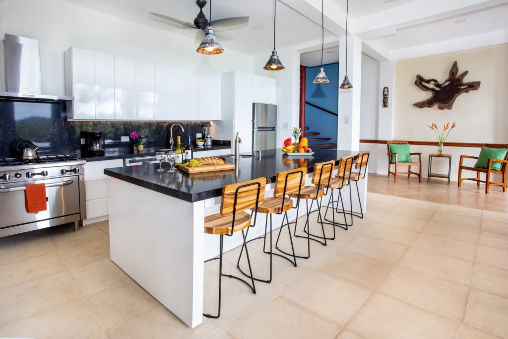 As you enter the villa, this large gourmet kitchen with breakfast bar seating greets you. 