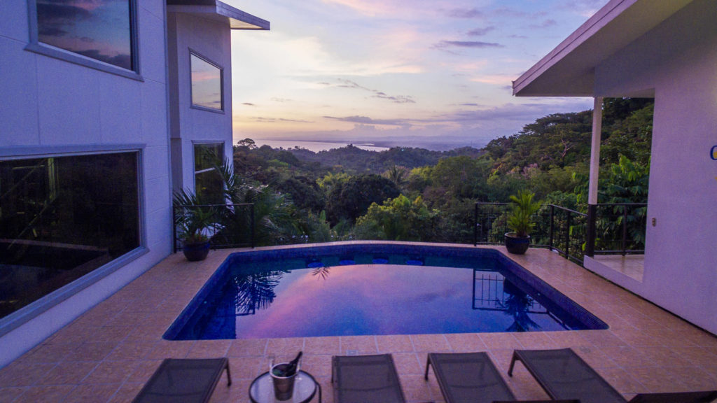 The evening view from the pool area with its stunning colors offers a truly magical end to your day.