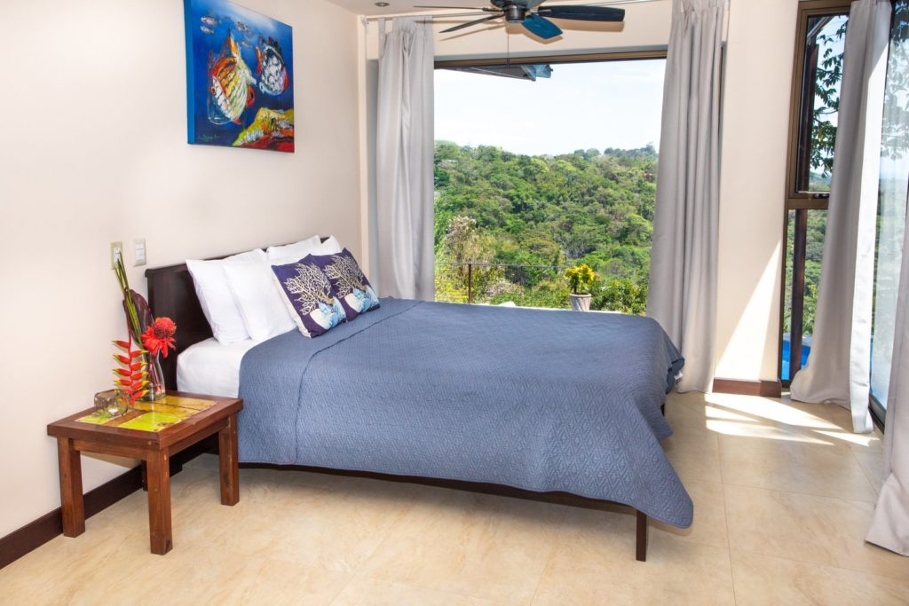 This very private queen bedroom is accessed off the pool deck and has a spectacular ocean view.