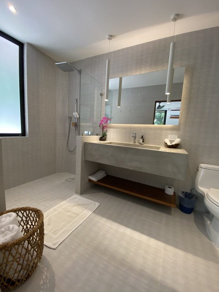 This luxurious bathroom displays the subtle thoughtful design of this private villa.