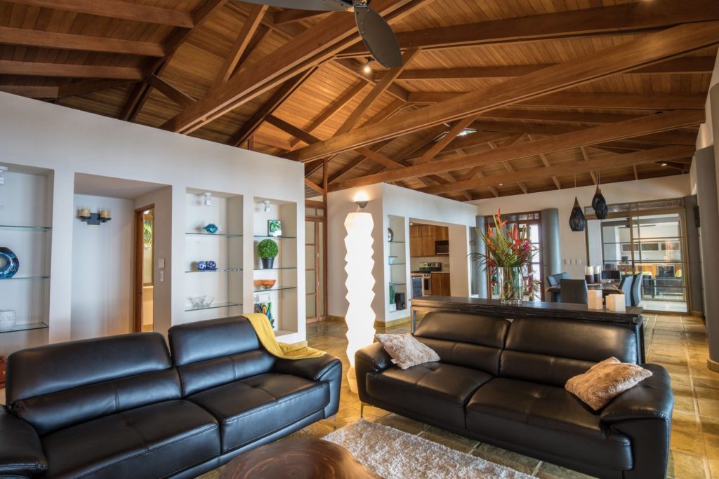 Luxury seating and opulent vaulted wooden ceilings.