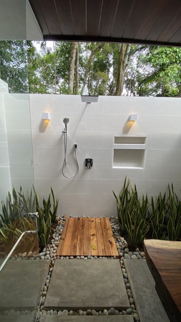 Refresh yourself in the shower with the rainforest above and tropical plants surrounding you.