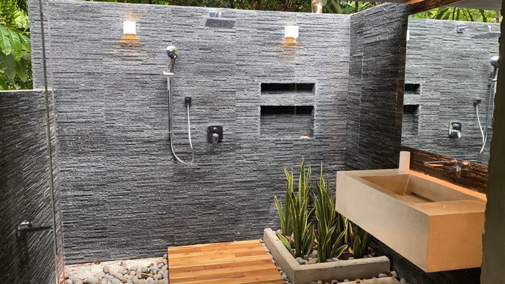 Shower under the stars in this beautiful external bathroom.