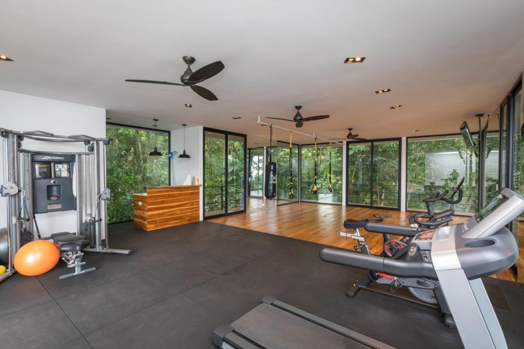 Weights, boxing, bike, treadmill, and plenty of space for yoga.